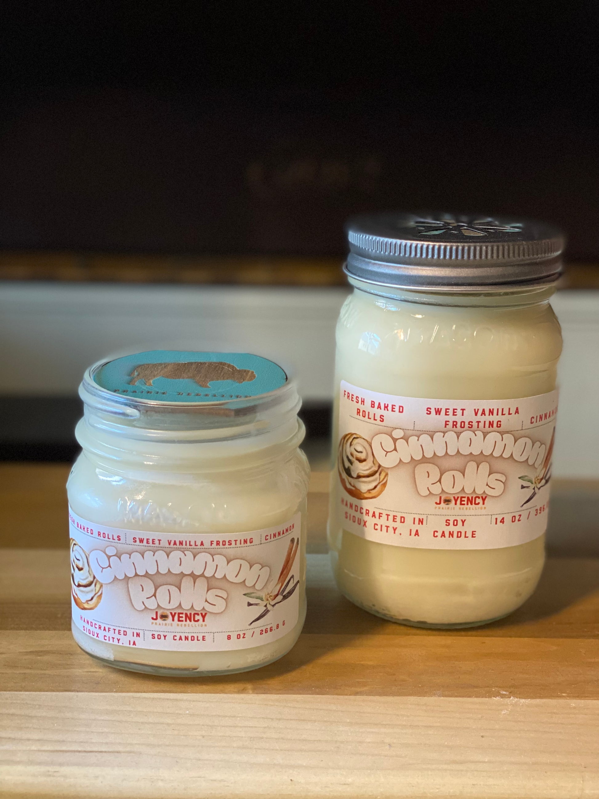 Cinnamon Rolls soy candle jars with bakery theme.