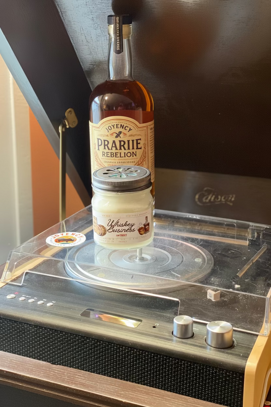 Bottle of 'Whiskey Business' on a vintage record player